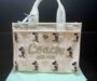 【DISNEY X COACH】カーゴ トート バッグ 26・リジェネラティブ コットン キャンバス / ミッキーマウス ガラスコーティング